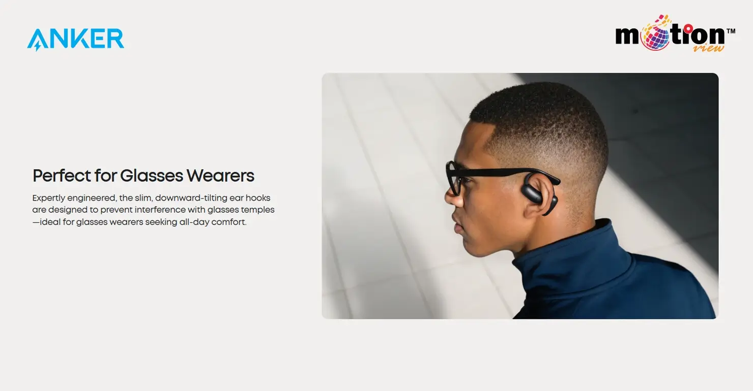 Side profile of a man wearing glasses and Soundcore AeroFit 2 headphones showing the slim, non-interfering ear hook design.