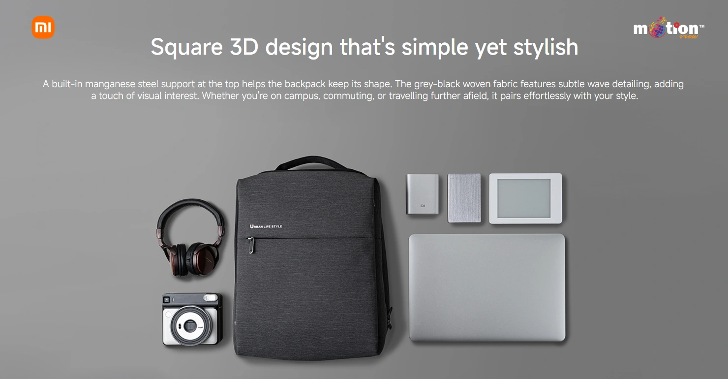 Flat lay showing the square 3D design of the Xiaomi City Backpack 2 alongside a laptop and daily tech essentials.