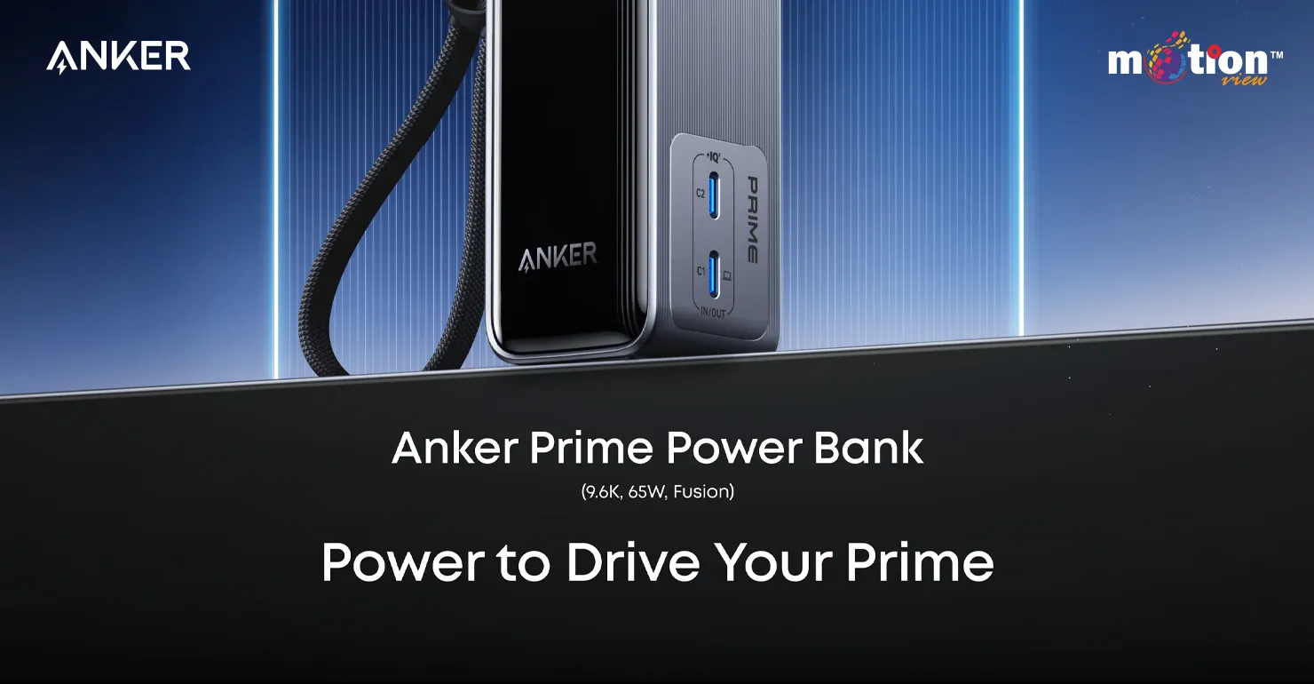 Close-up of the Anker Prime 9.6K 65W Fusion Charger highlighting its dual USB-C ports, sleek metallic finish, and convenient built-in lanyard strap