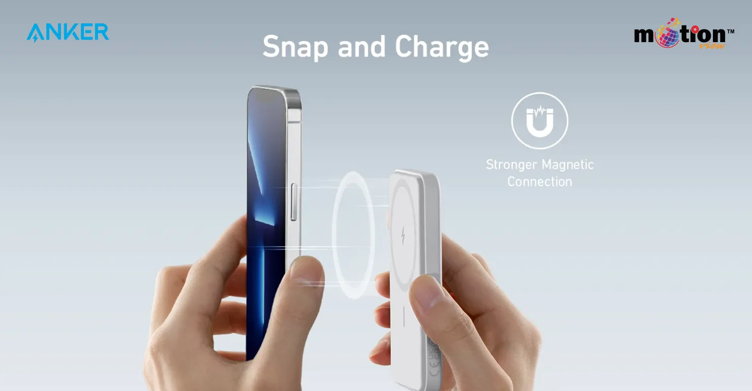 A traveler holding an iPhone securely charging with the travel-ready, compact Anker 621 MagGo Magnetic Battery attached